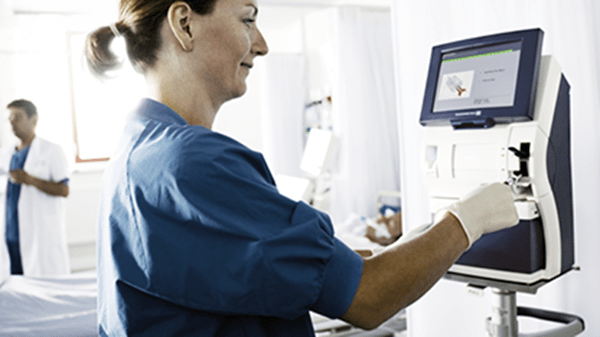 ABL90 FLEX blood gas analyzer used by a nurse